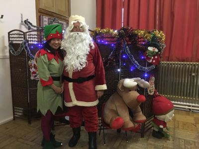 Santa and his Elf ready for the children Santa and his Elf ready for the children