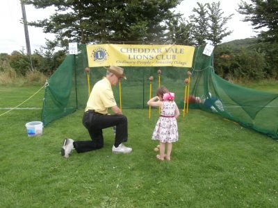 Coconut Shy Enjoyed by Children & Adults