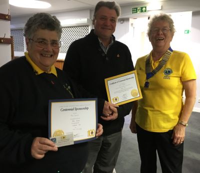 Presenting new member, Peter, with his badge & certificate Presenting new member, Peter, with his badge & certificate